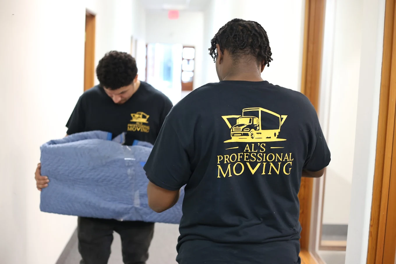 Professional movers providing careful moving service